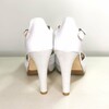 Chaussures de mariée blanches et ivoires